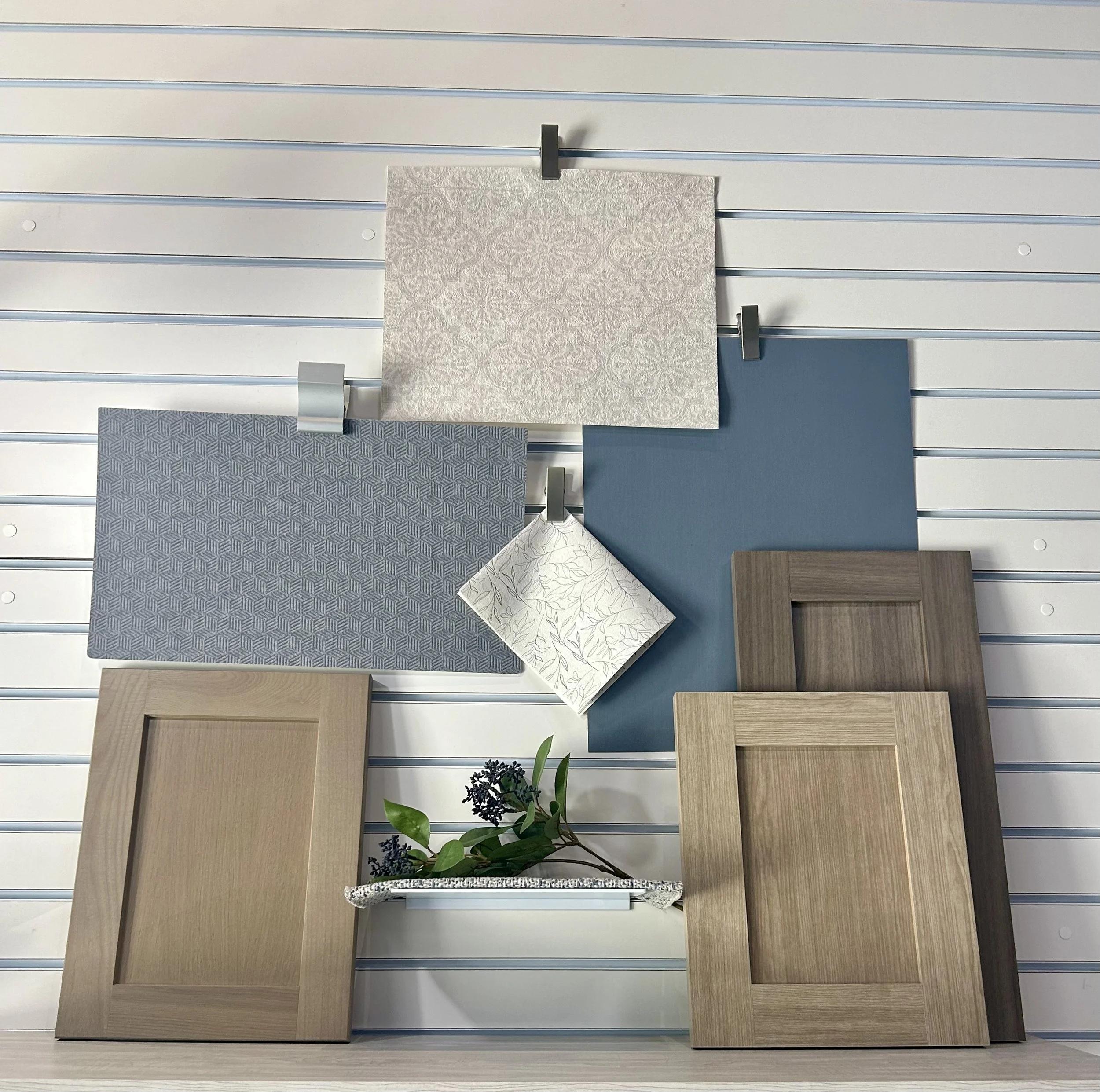 Wall design- This was a project I was tasked with. The goal was to use one brand (Gravure Ink) and showcase their products. This included their wallpapers and woodgrains. I added accents like plants to tie in the elements.