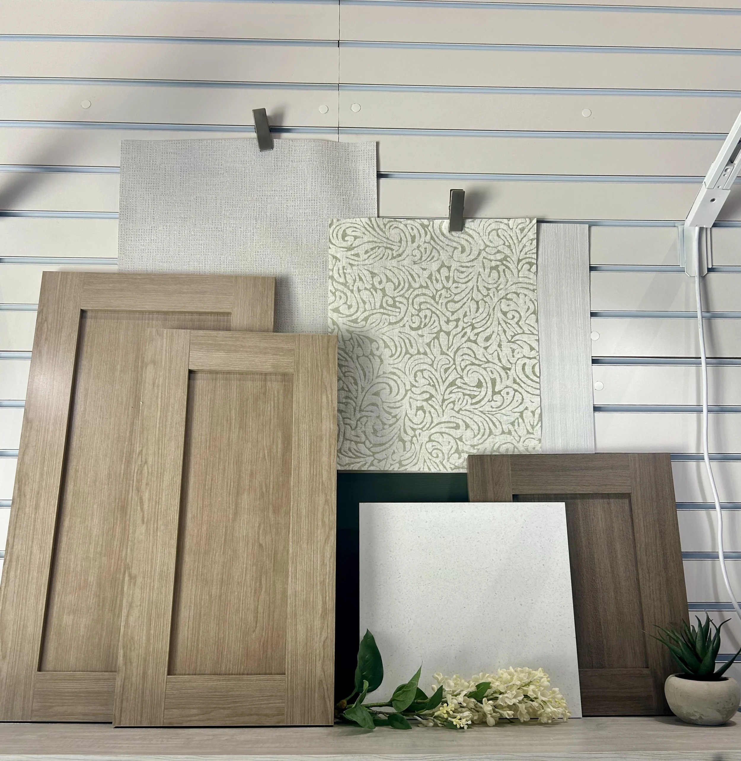 Wall Design- This was the second part of the wall design project I was tasked with. For this section, I focused on the lighter woodgrain and added supporting wallpaper to show off the companies different abilities. 