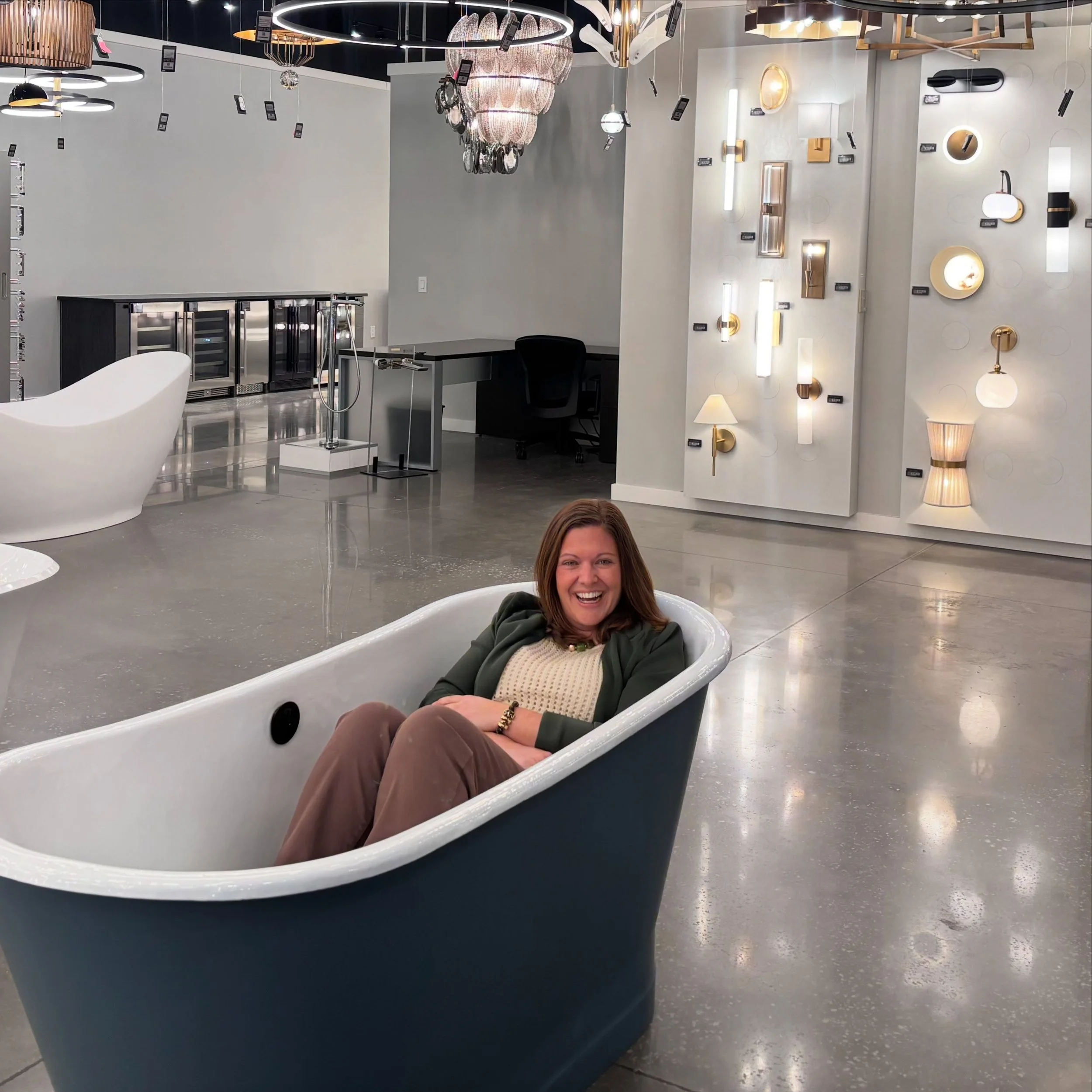 Planning a bathroom remodel with a tub? We always recommend a showroom that allows you to sit in the tubs before you buy. Embarrassed? Don&rsquo;t be. Channel your inner Emily and climb on in.