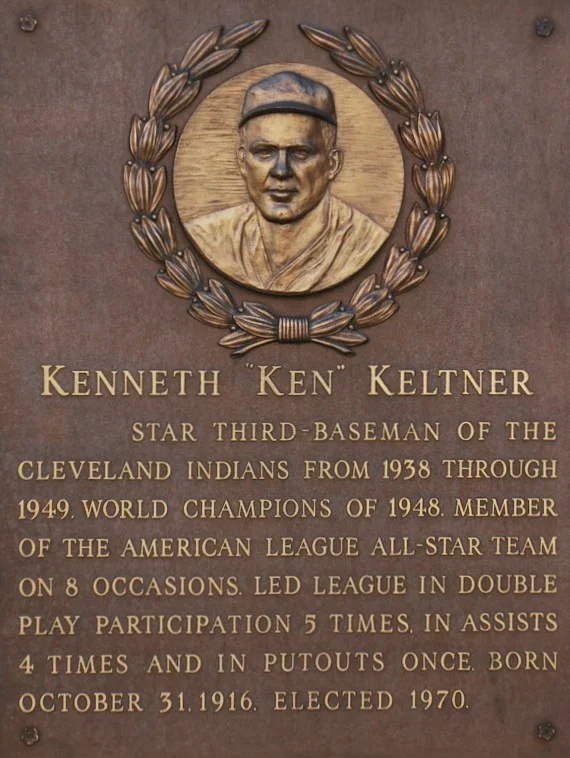 Plaque with a carved portrait of Kenneth 'Ken' Keltner, surrounded by a laurel wreath, and an inscription detailing his baseball career and achievements.