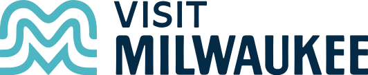 Logo for Visit Milwaukee featuring stylized water waves and text.