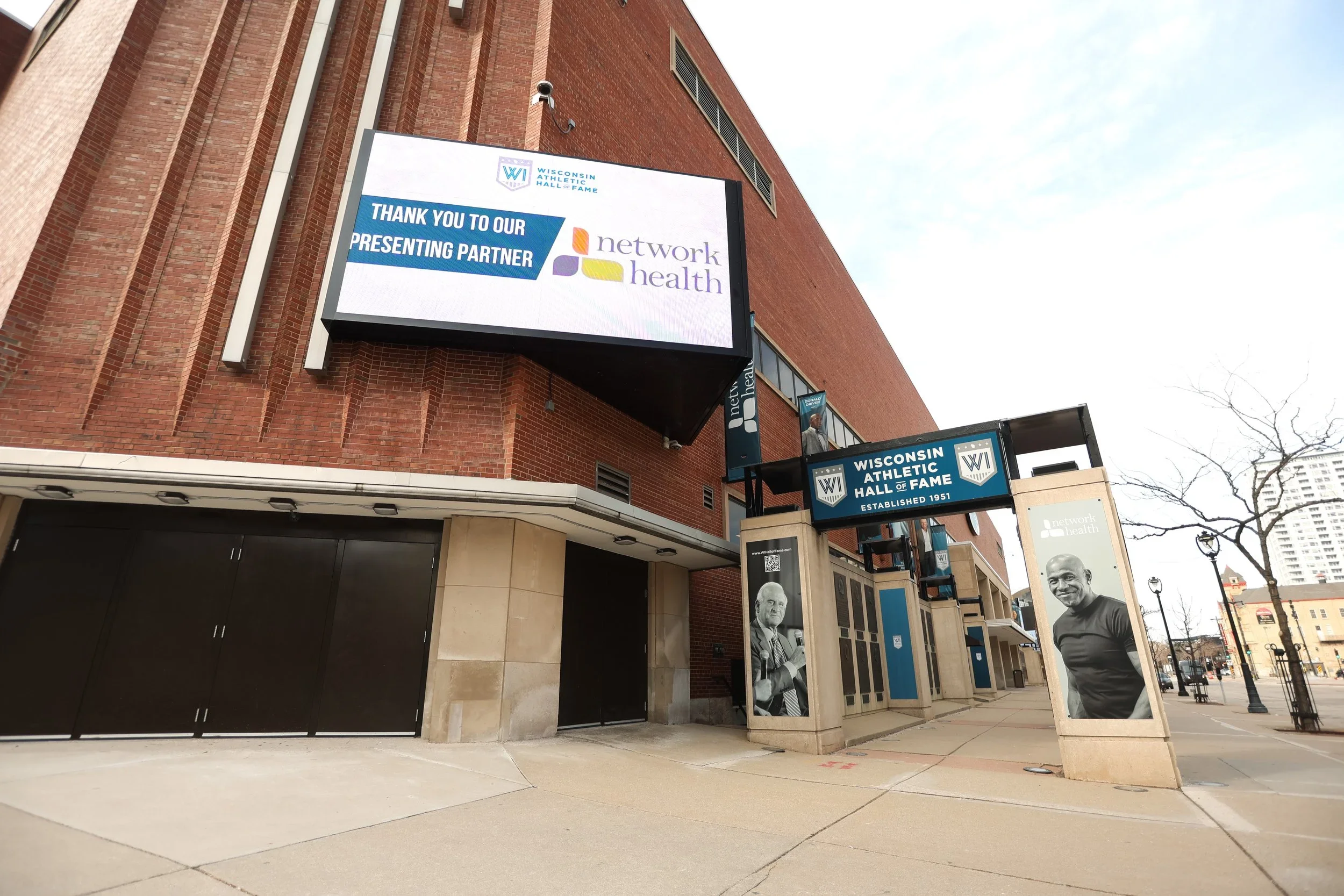 Exterior view of the Wisconsin Athletic Hall of Fame Walkway with digital signage LED Board