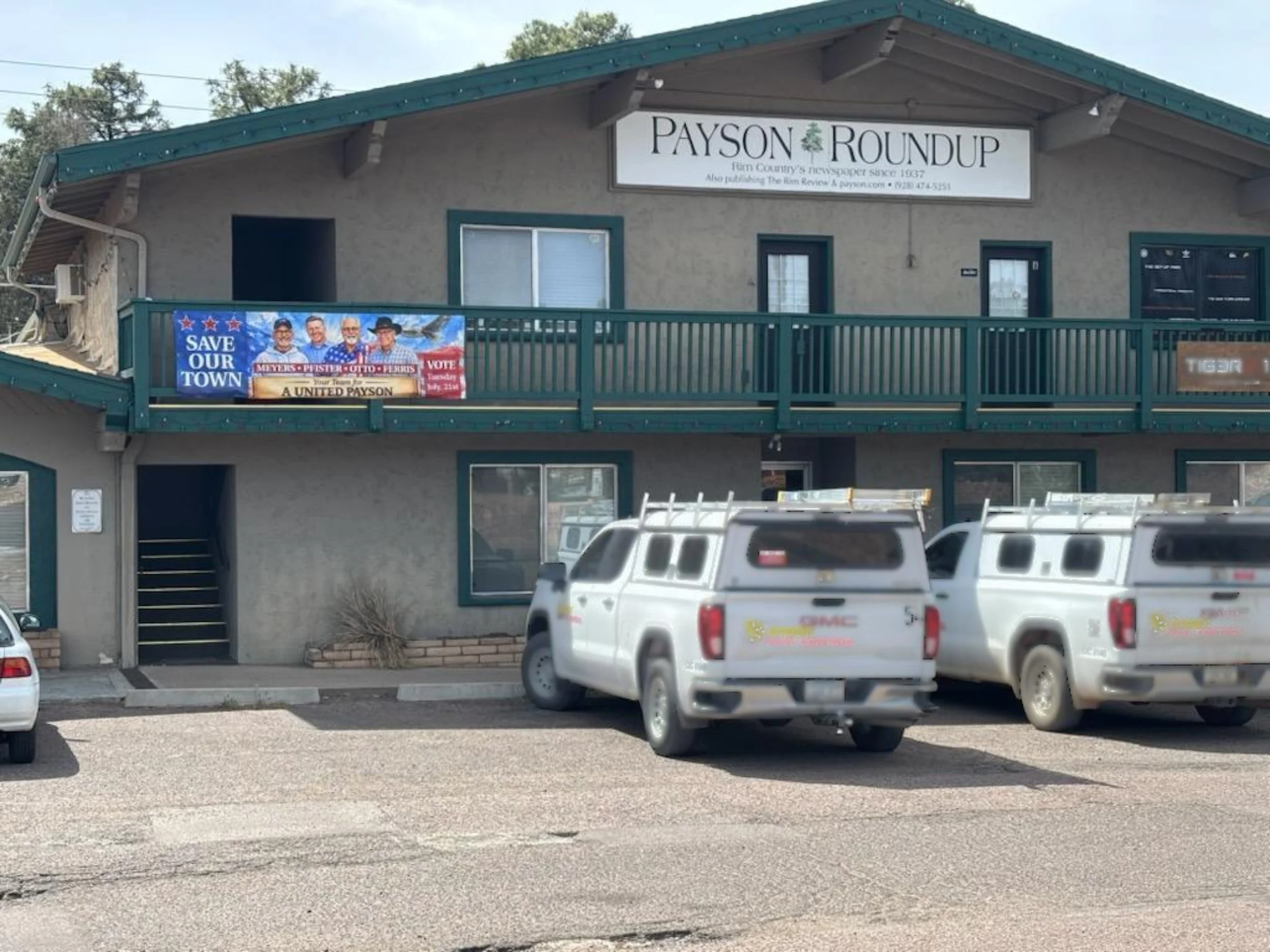 Save Our Town - Banner on the Roundup Building wide