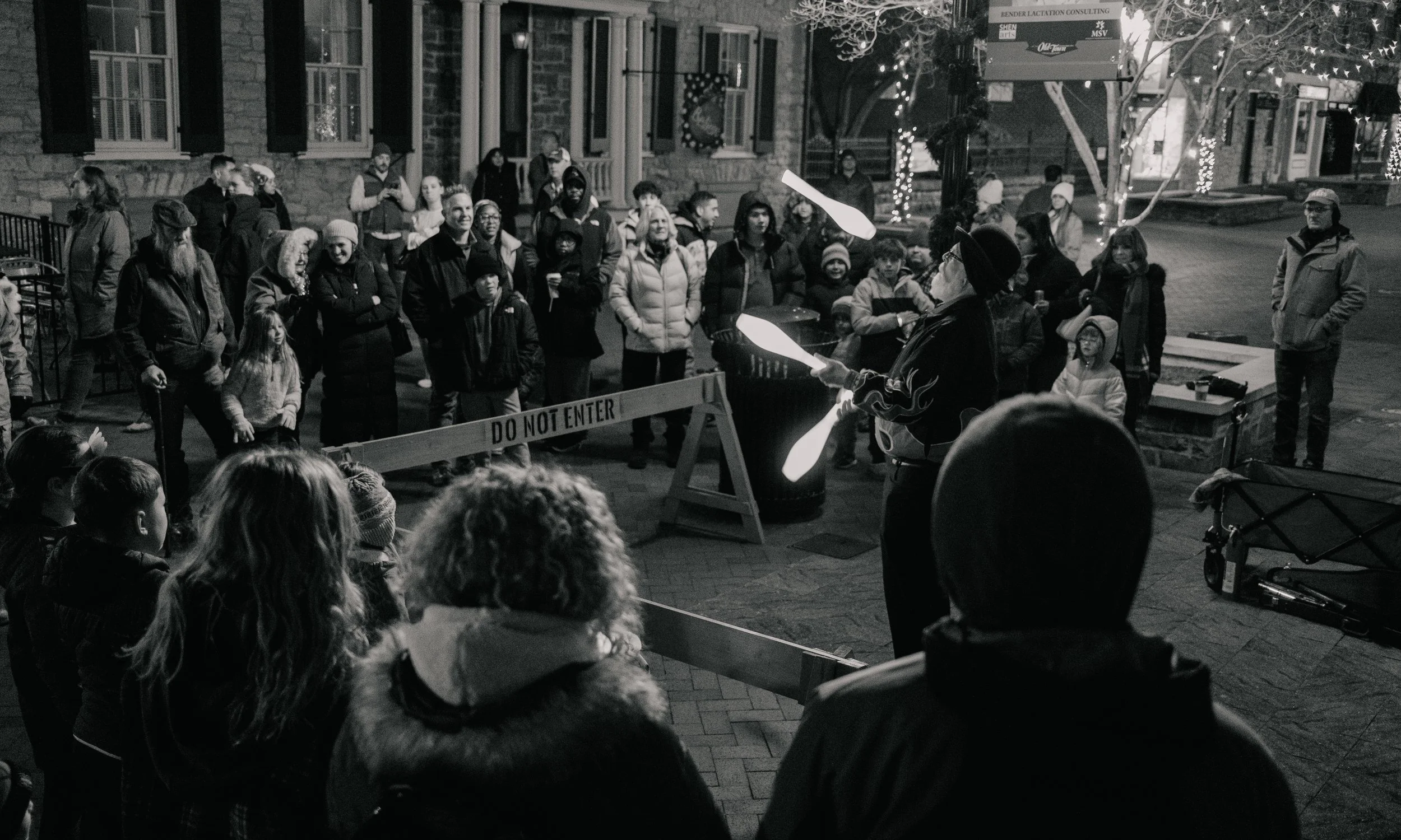 A street performer juggles in Old Town Winchester, VA - Winchester Event Photographer.