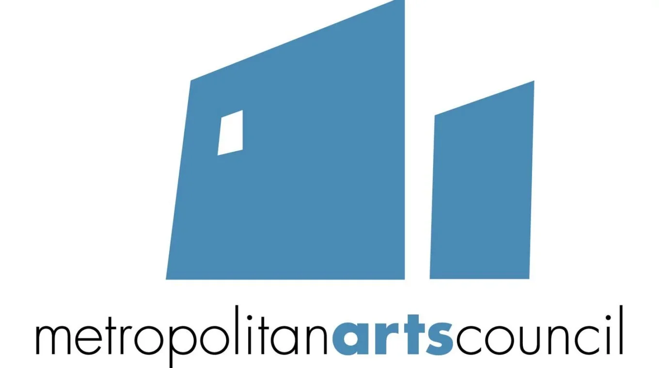 Logo of Metropolitan Arts Council with stylized blue 'm' and 'a' and the text 'metropolitan arts council' underneath.