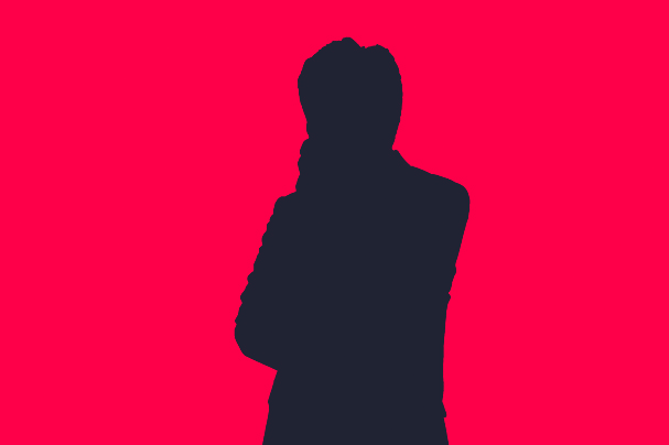 Silhouette of a finance leader with crossed arms against a pink background.