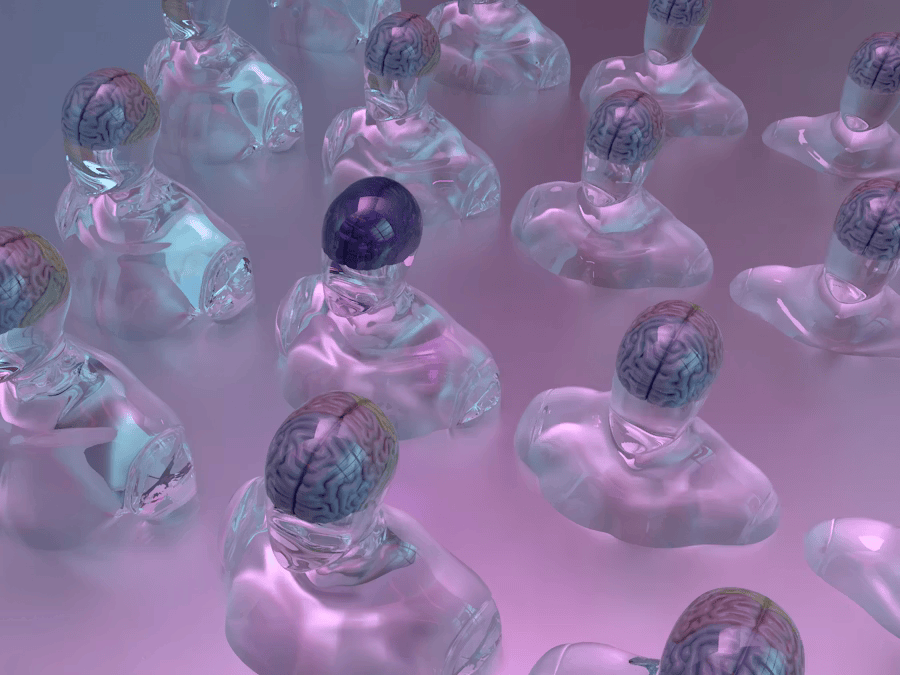 Multiple glass bust sculptures with visible brain patterns on their heads, placed on a pink, foggy surface.