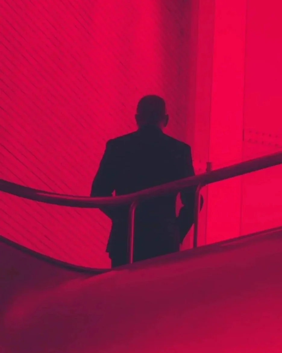 Geometric drawing of an outline square with sections divided by vertical, horizontal, and circle lines.