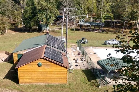 bird's eye view of a solar array on a Boy Scouts pool house roof