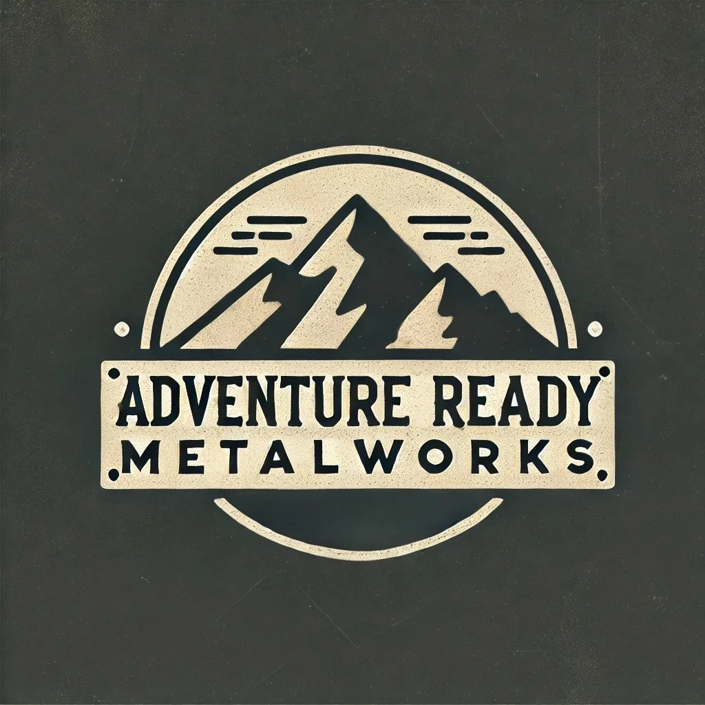 A black and white logo with a mountain illustration at the top, and the text "Adventure Ready Metalworks" in a rectangular banner below the mountain.