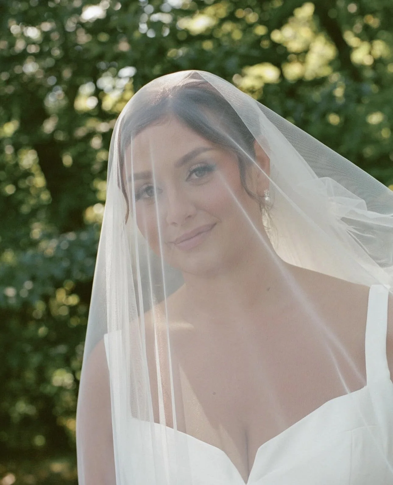 A photo of Ashley Hart, owner of Ashley Hart Makeup Artistry, a soft glam bridal specialist from Buffalo, NY