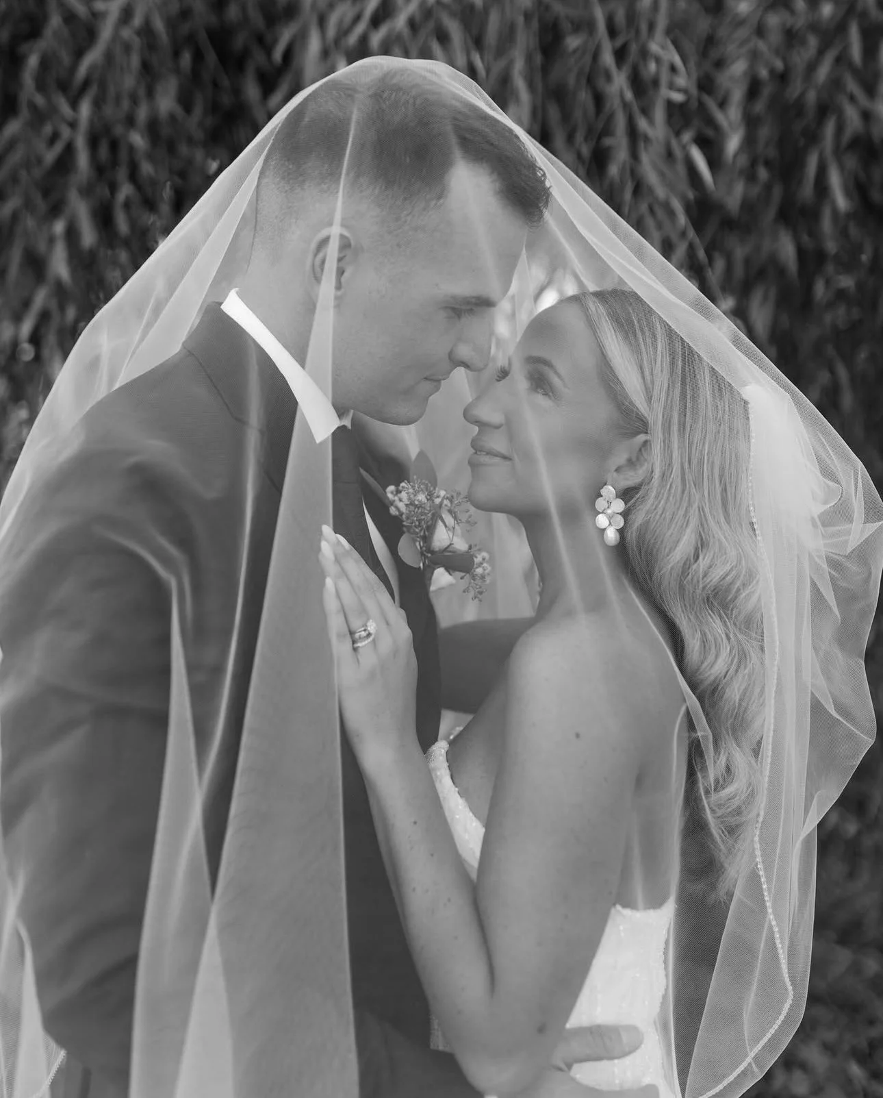 A photo of Ashley Hart, owner of Ashley Hart Makeup Artistry, a soft glam bridal specialist from Buffalo, NY