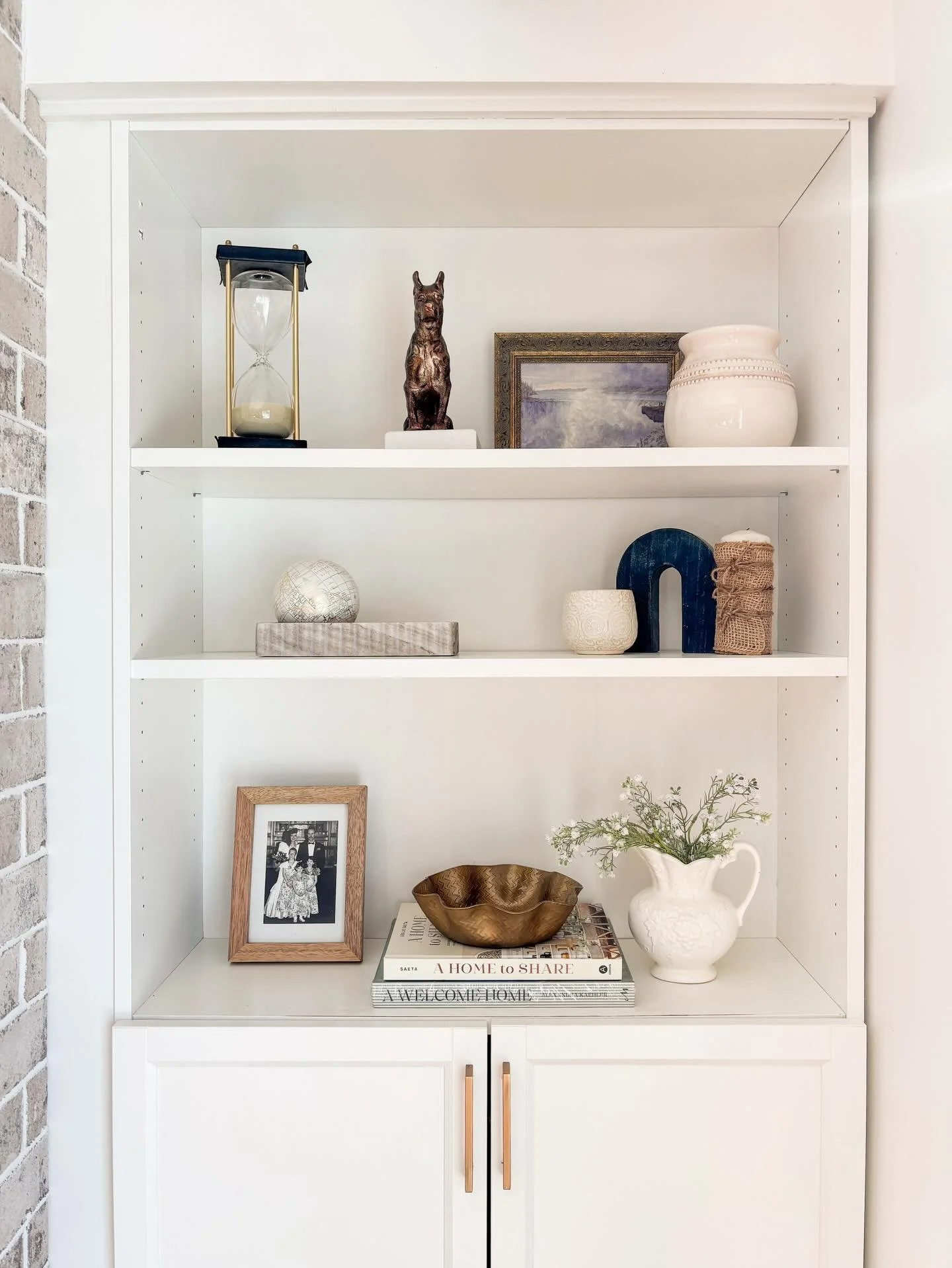 We had the pleasure of styling this beautiful built-in! We layered some of our client&rsquo;s items with newly sourced pieces &amp; a few from The Plumber&rsquo;s Wife Home Decor collection. This space now feels warm, inviting, intentionally styled a