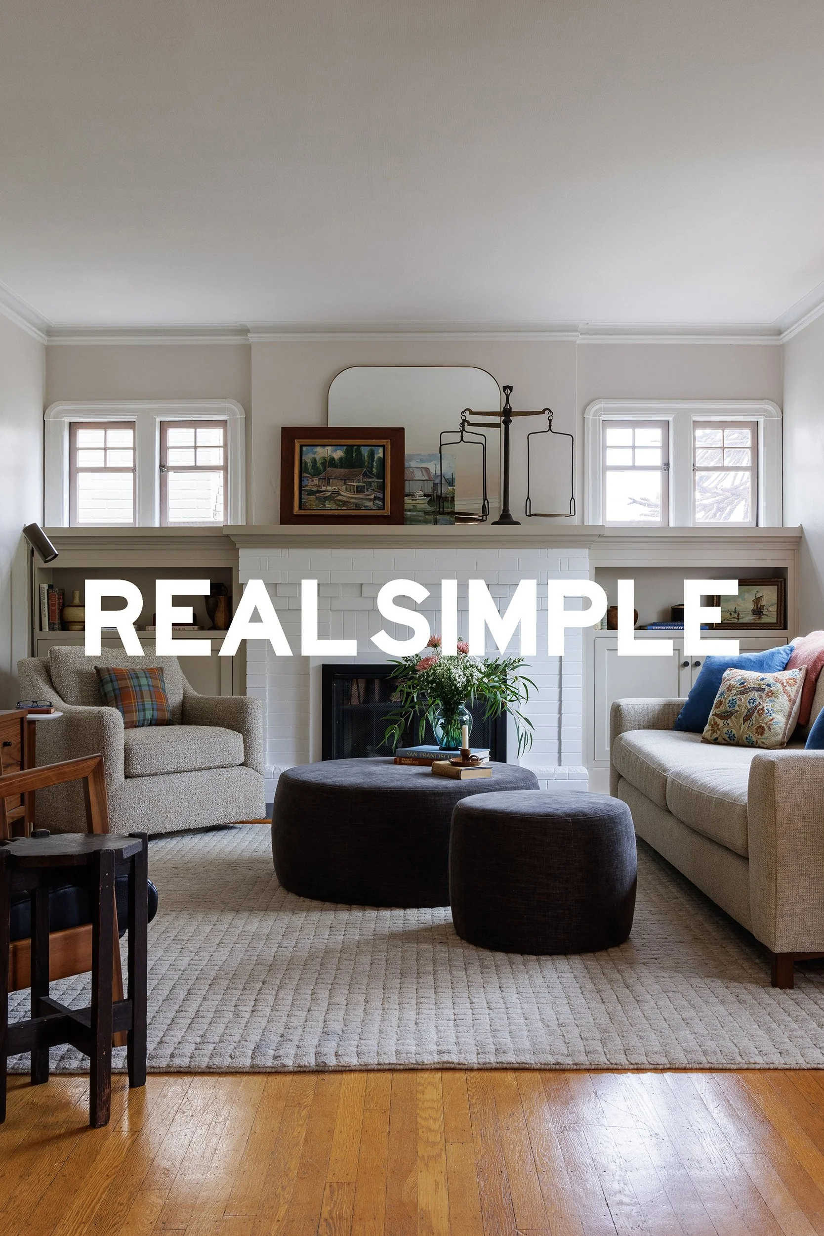 Real Simple press feature preview with a transitional living room, neutral furnishings, and fireplace built-ins by Full Bloom Interior Design in Seattle.