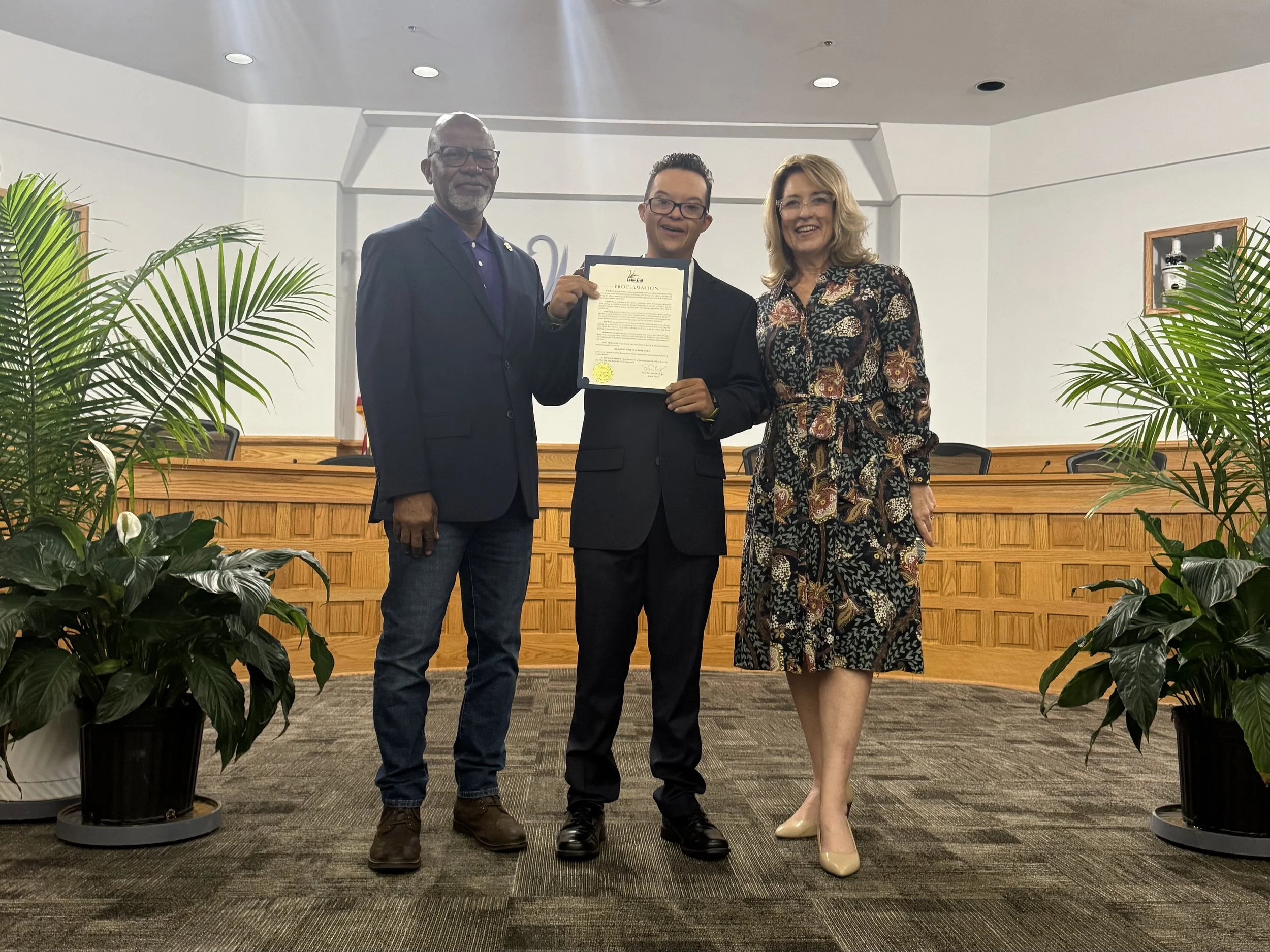 Robert Norris Man of Iron receiving the City of Lakeland proclamation recognizing November 15 as “Showing What’s Possible Day.”
