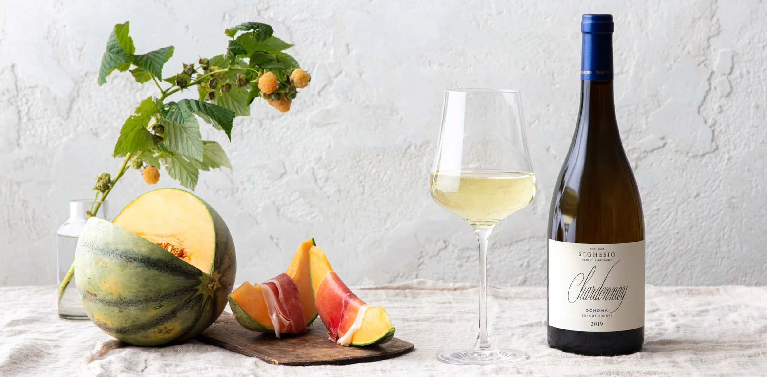 ErinScott-SEGHESIO-ProductFamilies-2418-2019Chardonnay-withmelonandraspberrybranch.jpg