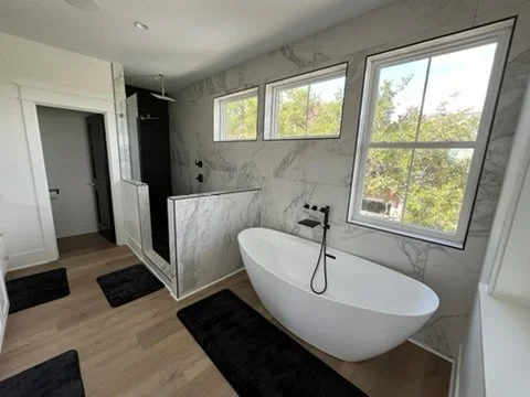 01-finished-looking-master-bathroom-tub-and-shower.jpeg