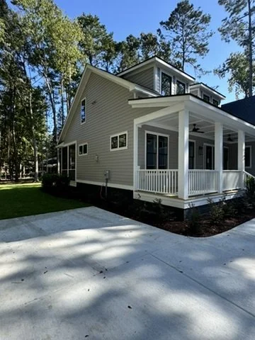 02-finished-exterior-porch-and-drive.jpeg