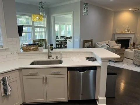 02-finished-kitchen-sink-and-living.jpeg