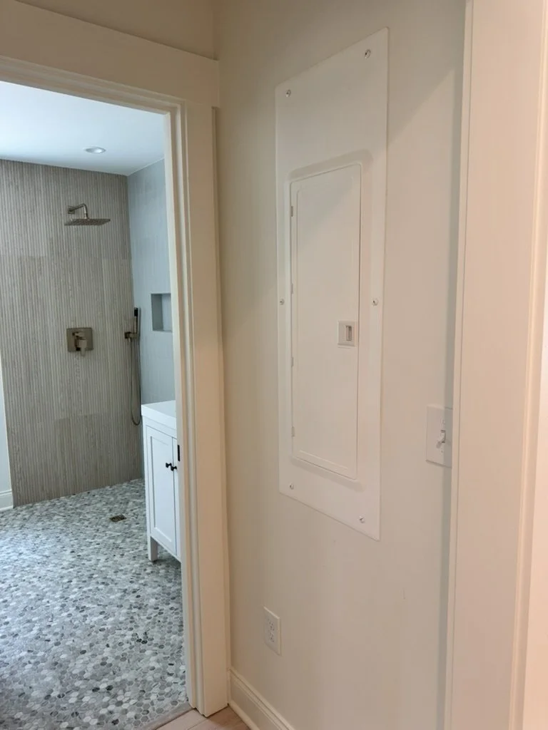 07-interior-utility-panel-near-bathroom.jpeg