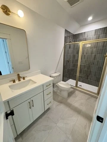 15-finished-bathroom-shower-and-vanity.jpeg