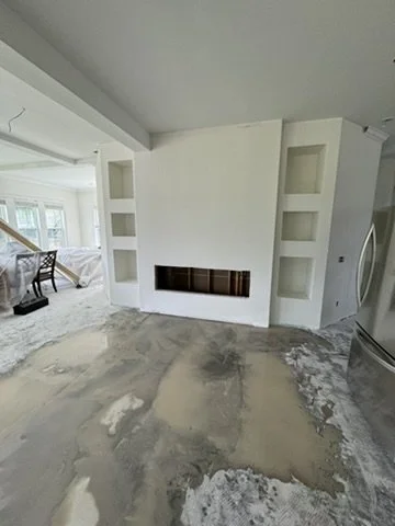 06-progress-fireplace-and-interior.jpeg