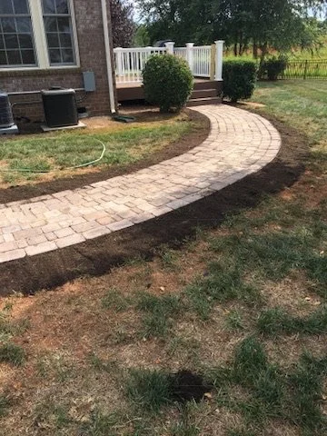 01-paver-walkway-curved-approach.jpeg