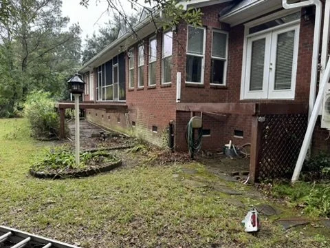 01-existing-deck-and-brick-exterior.jpeg