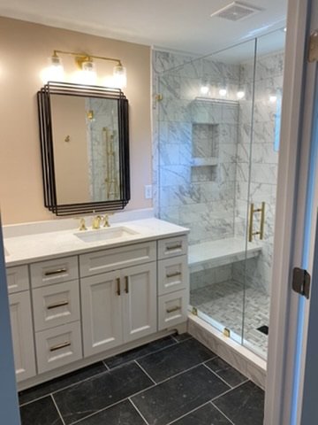 10-finished-bathroom-shower-and-vanity-wide-view.jpeg