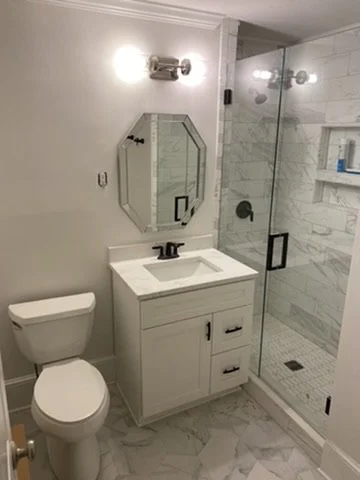 12-finished-bathroom-vanity-and-shower-wide-view.jpeg