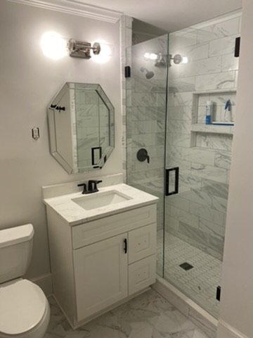 03-finished-bathroom-vanity-and-shower.jpeg