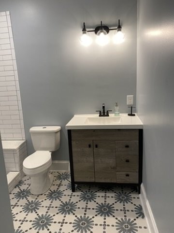 01-finished-bathroom-vanity-and-patterned-floor.jpeg