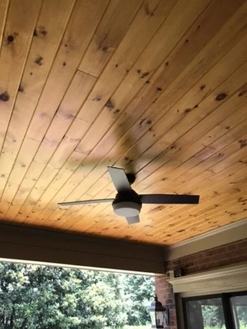 13-finished-covered-porch-wood-ceiling-and-fan.jpeg