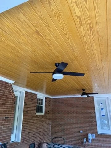 01-finished-covered-porch-wood-ceiling-and-fans.jpeg
