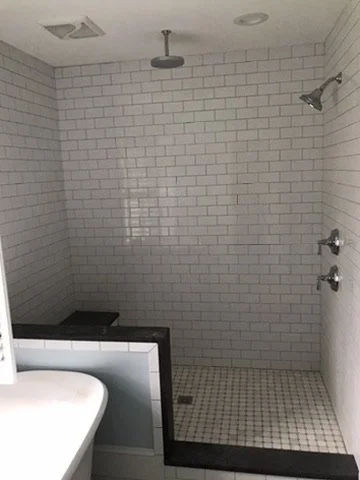 07-finished-tiled-shower-and-tub-divider.jpeg