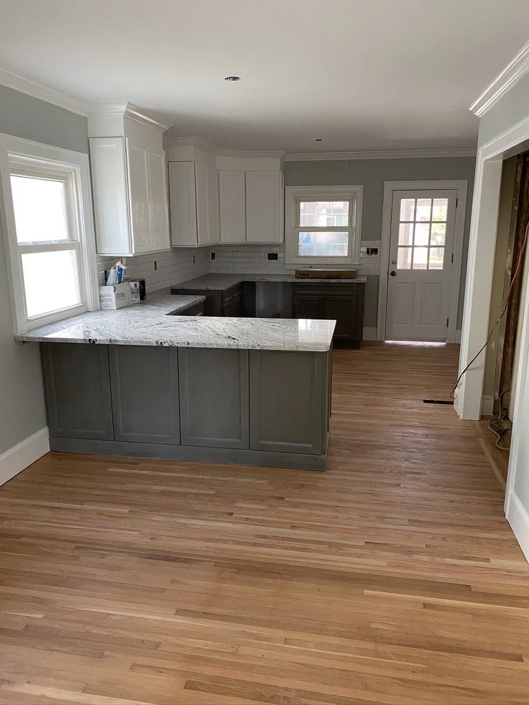 02-finished-kitchen-remodel-white-and-gray-cabinetry.jpeg