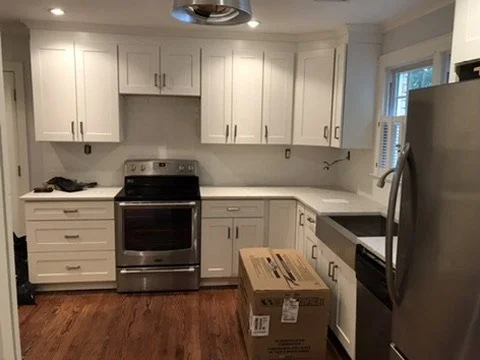 02-finished-kitchen-range-and-cabinet-wall.jpeg