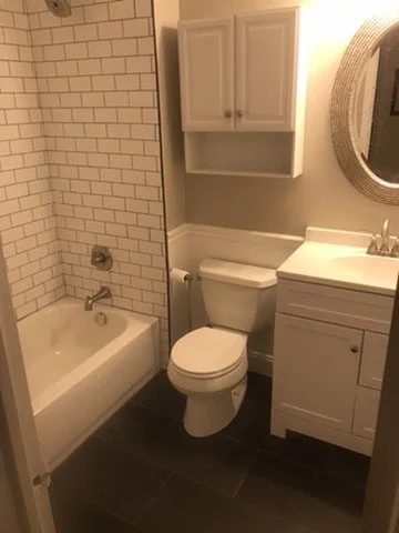 02-finished-bathroom-tub-toilet-and-vanity.jpeg