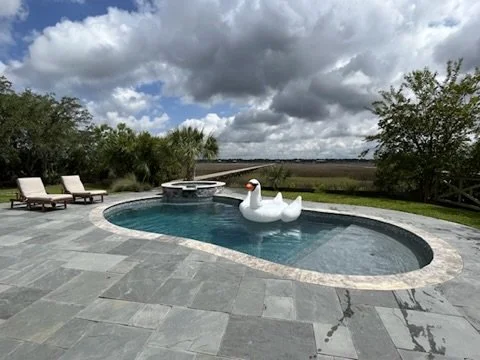 10-finished-pool-and-paver-patio-with-pool.jpeg