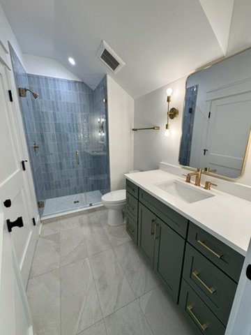 21-finished-bathroom-shower-and-vanity.jpeg