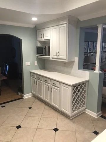 03-finished-kitchen-cabinet-wall-and-wine-storage.jpeg