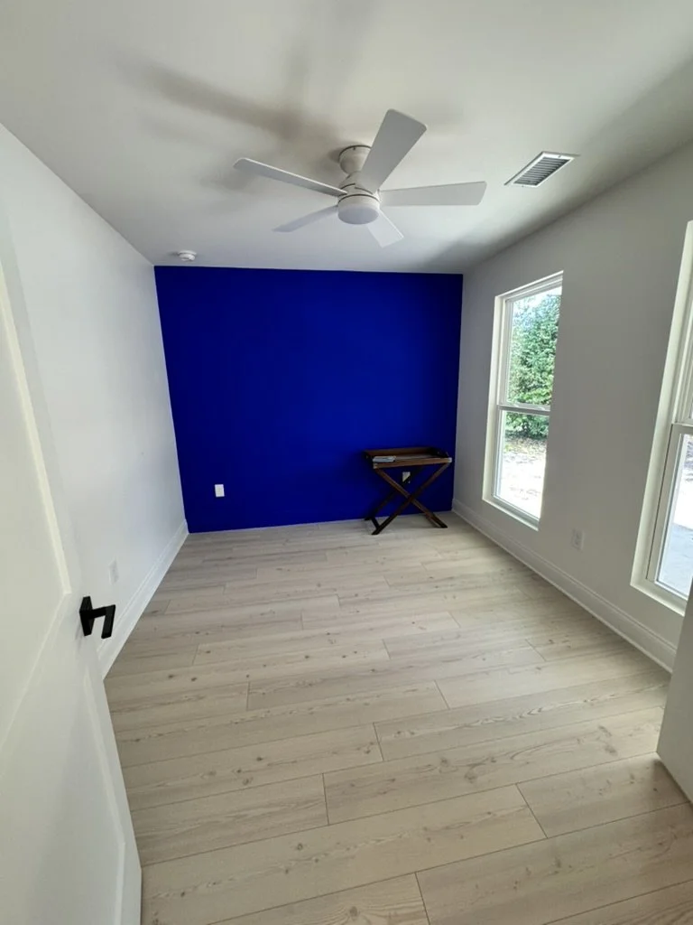 10-finished-room-blue-accent-wall.jpeg