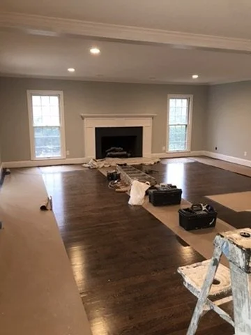 09-living-room-floor-and-trim-progress.jpeg