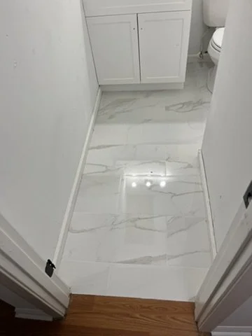 06-bathroom-2-floor-and-vanity.jpeg