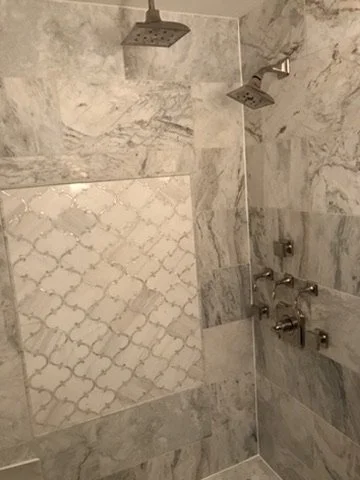 01-finished-marble-shower-dual-showerheads.jpeg