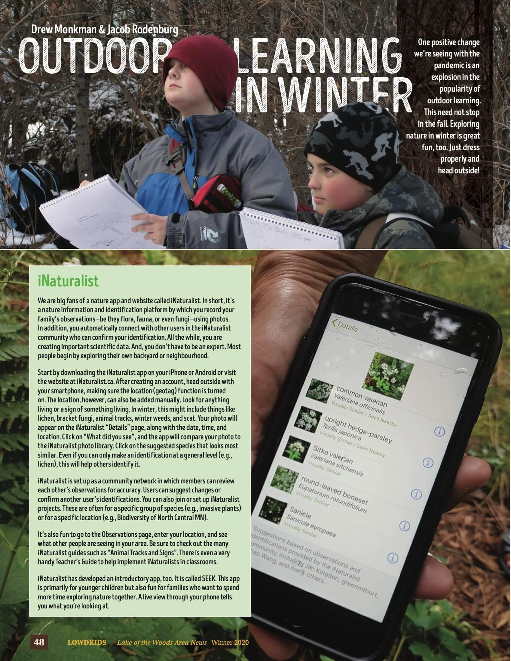 Two children in winter clothing outdoors, one holding a notepad and the other looking at a smartphone with the iNaturalist app open, surrounded by trees and snow.