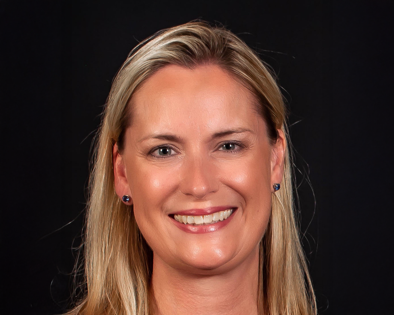 Headshot of woman smiling at camera