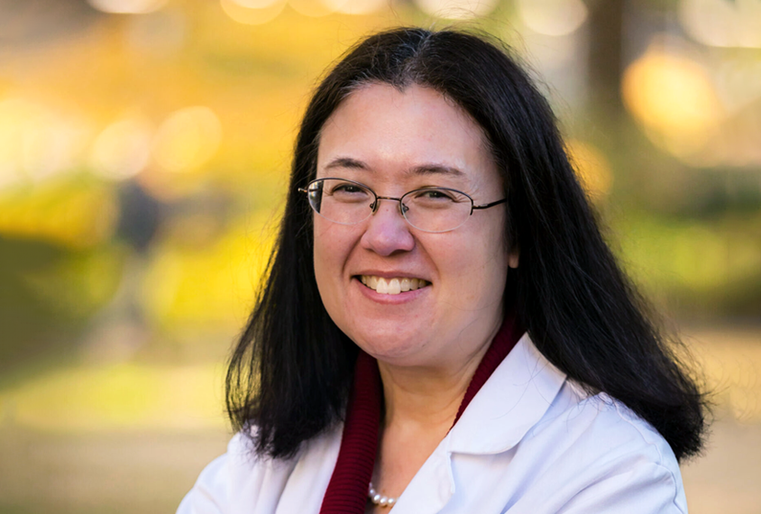 Headshot of woman in lab coat