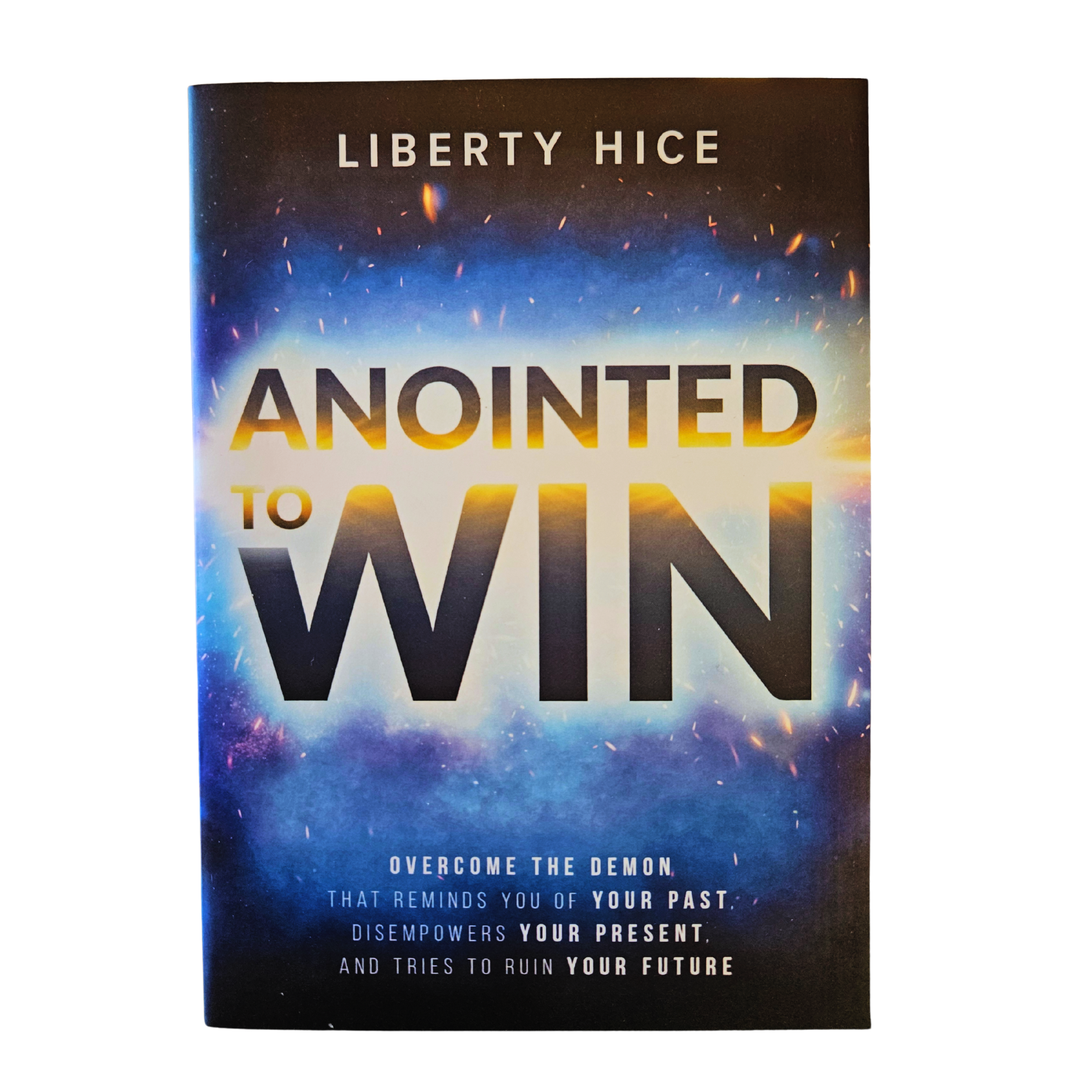 Book cover titled "Anointed to Win" by Liberty Hice, with a background of a colorful nebula, sparkles, and light rays, and a subtitle about overcoming the demon that reminds you of your past and tries to ruin your future.