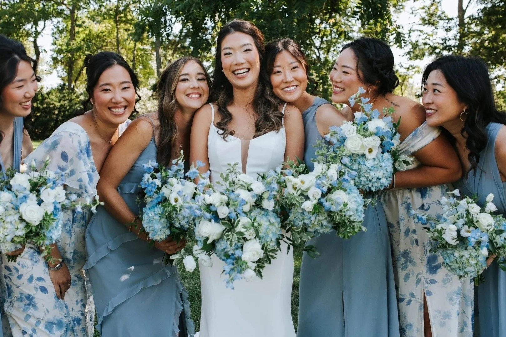 Bridal bouquet, bridesmaids bouquets, blue and white wedding flowers